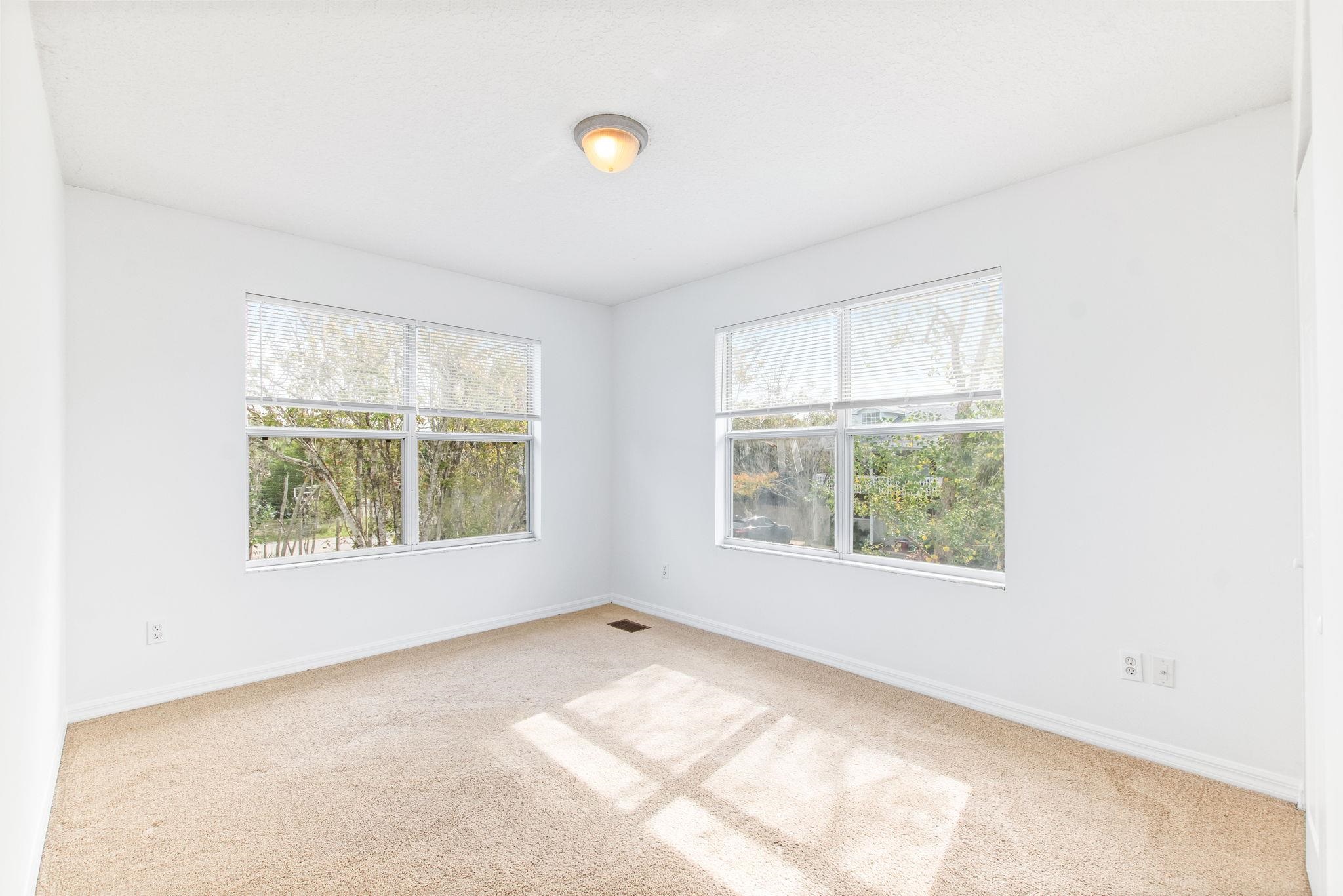 202 F Street St. Augustine, FL 32080 - Photo 23 of 28 an empty room with a window