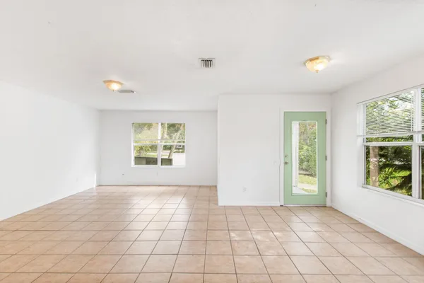 a view of an empty room and window
