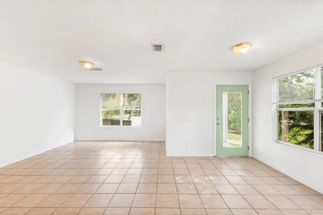 a view of an empty room and window