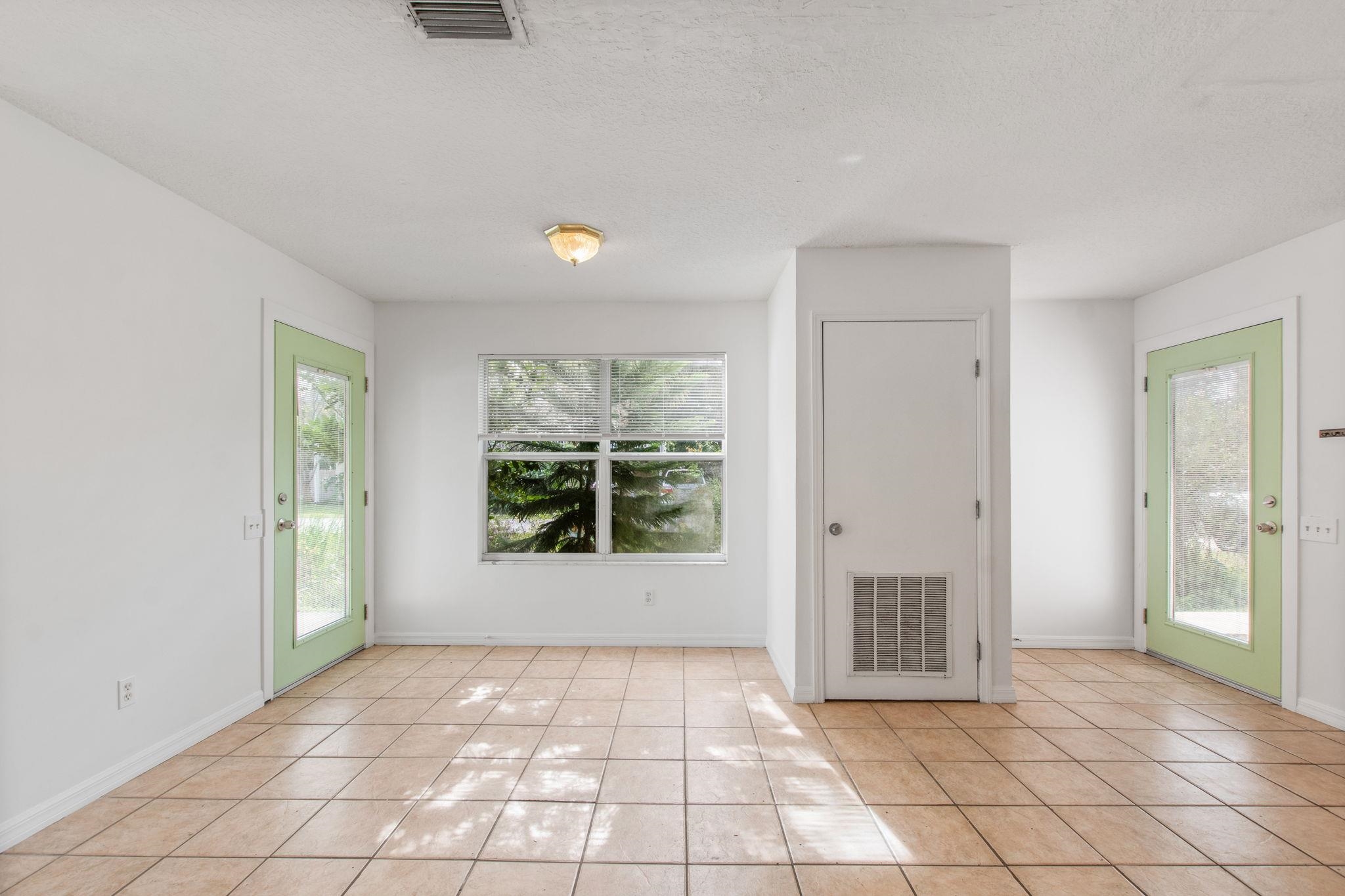 202 F Street St. Augustine, FL 32080 - Photo 10 of 28 an empty room with windows and closet