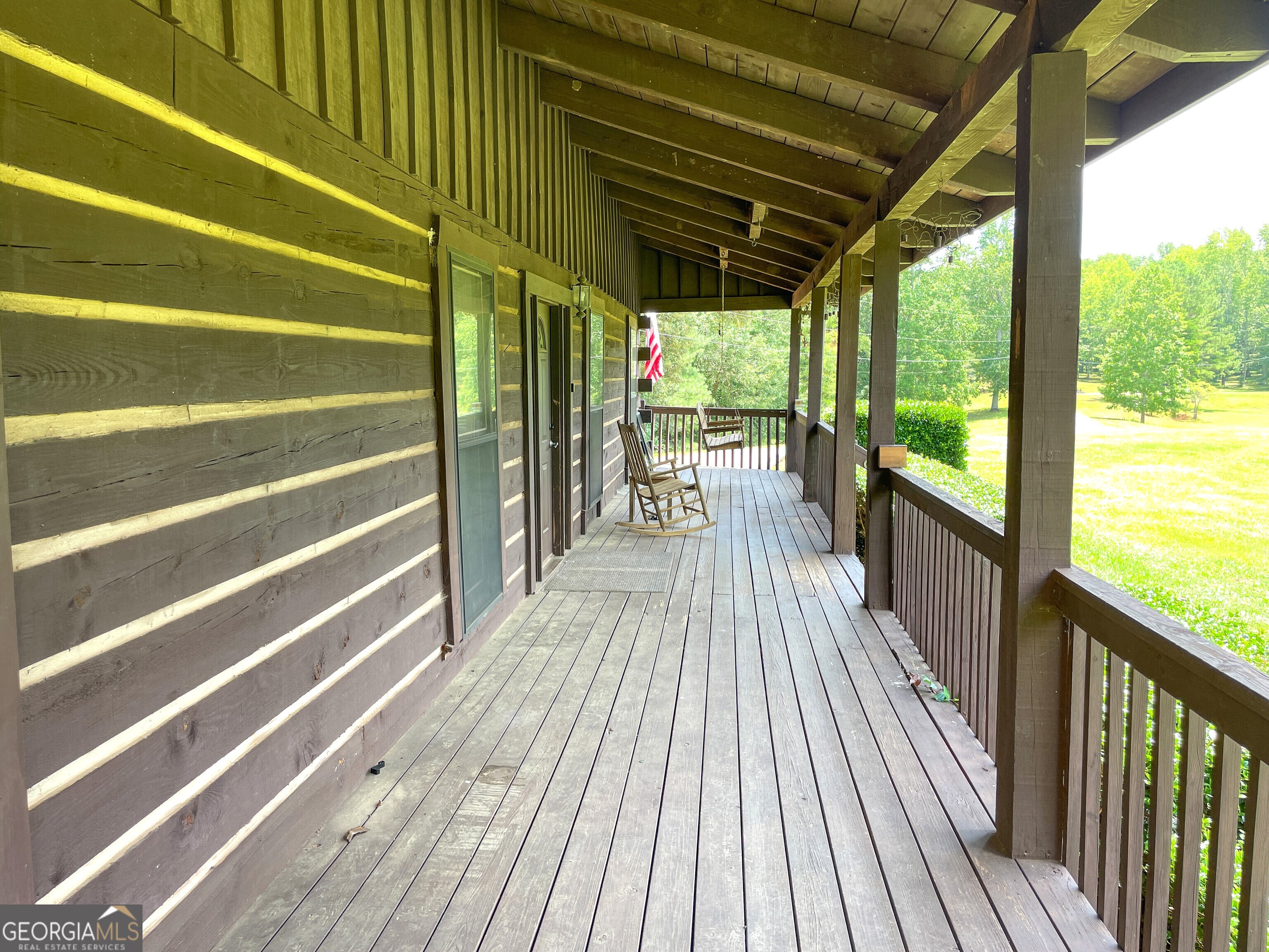 305 West Drive Roopville, GA 30170 - Photo 15 of 70 a view of outdoor space with a deck