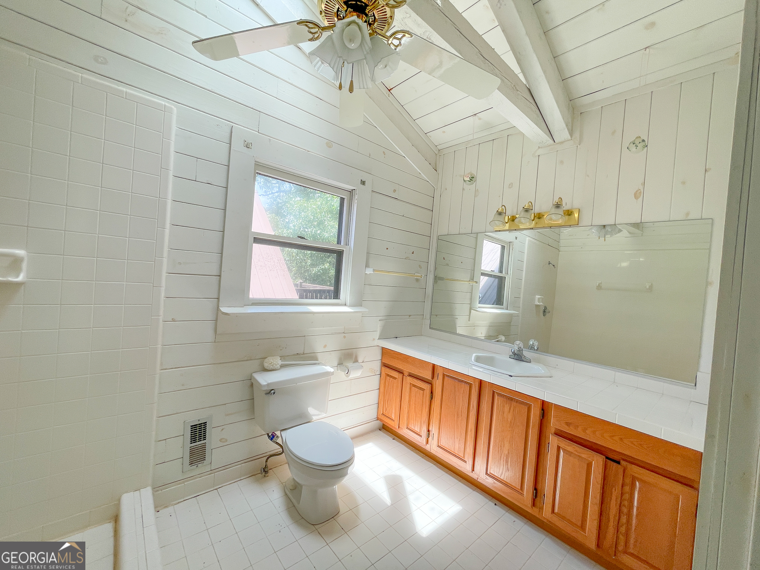 305 West Drive Roopville, GA 30170 - Photo 45 of 70 a bathroom with a sink a toilet and bathtub