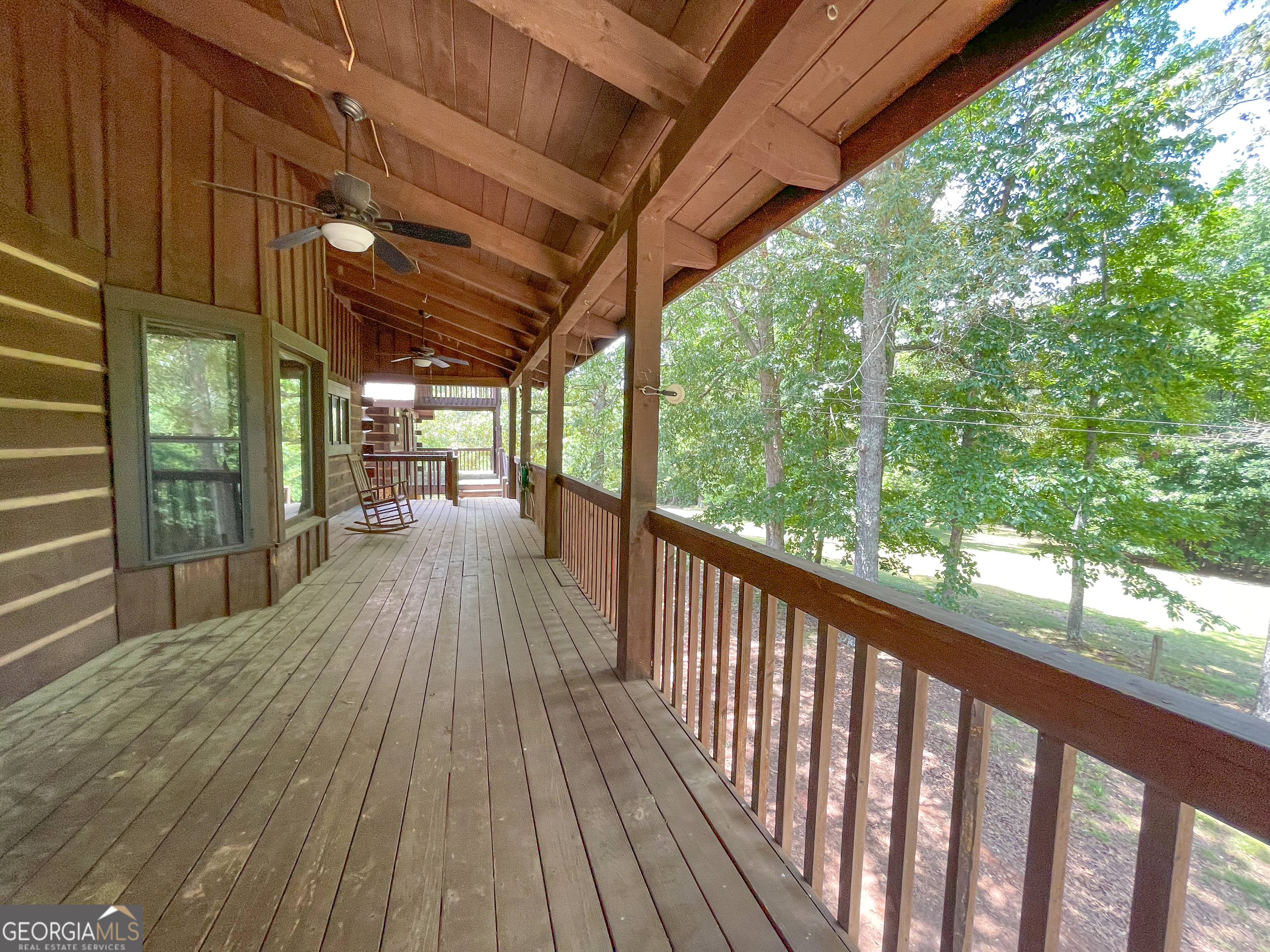 305 West Drive Roopville, GA 30170 - Photo 52 of 70 a view of porch with wooden floor