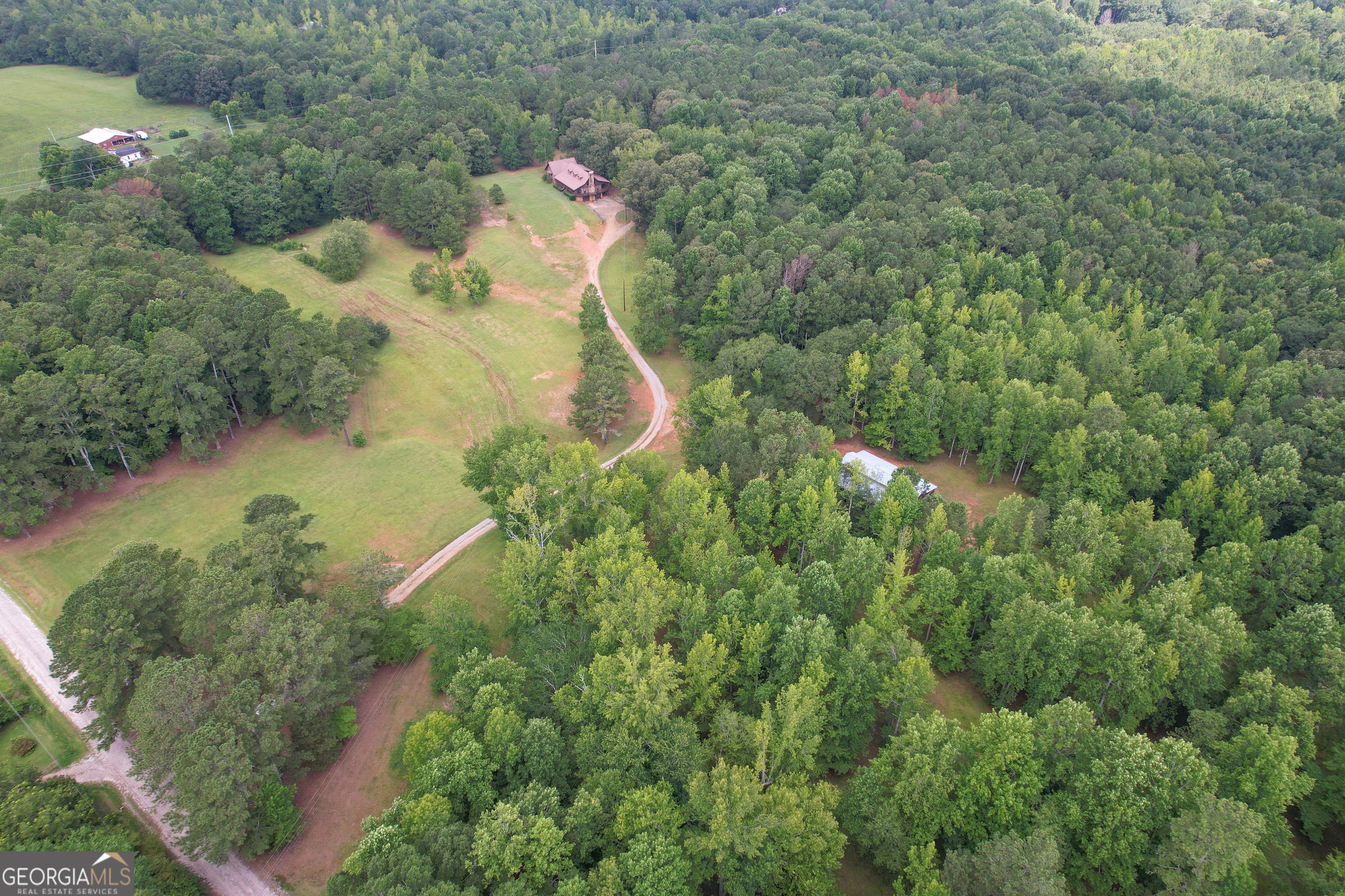 305 West Drive Roopville, GA 30170 - Photo 10 of 70 an aerial view of residential house with outdoor space and trees all around
