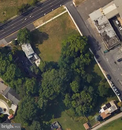 an aerial view of residential house with outdoor space