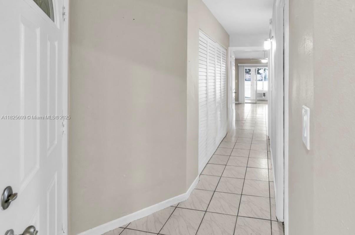 18801 Northeast 2nd Avenue, Unit 1006 Miami, FL 33179 - Photo 7 of 8 a view of a hallway