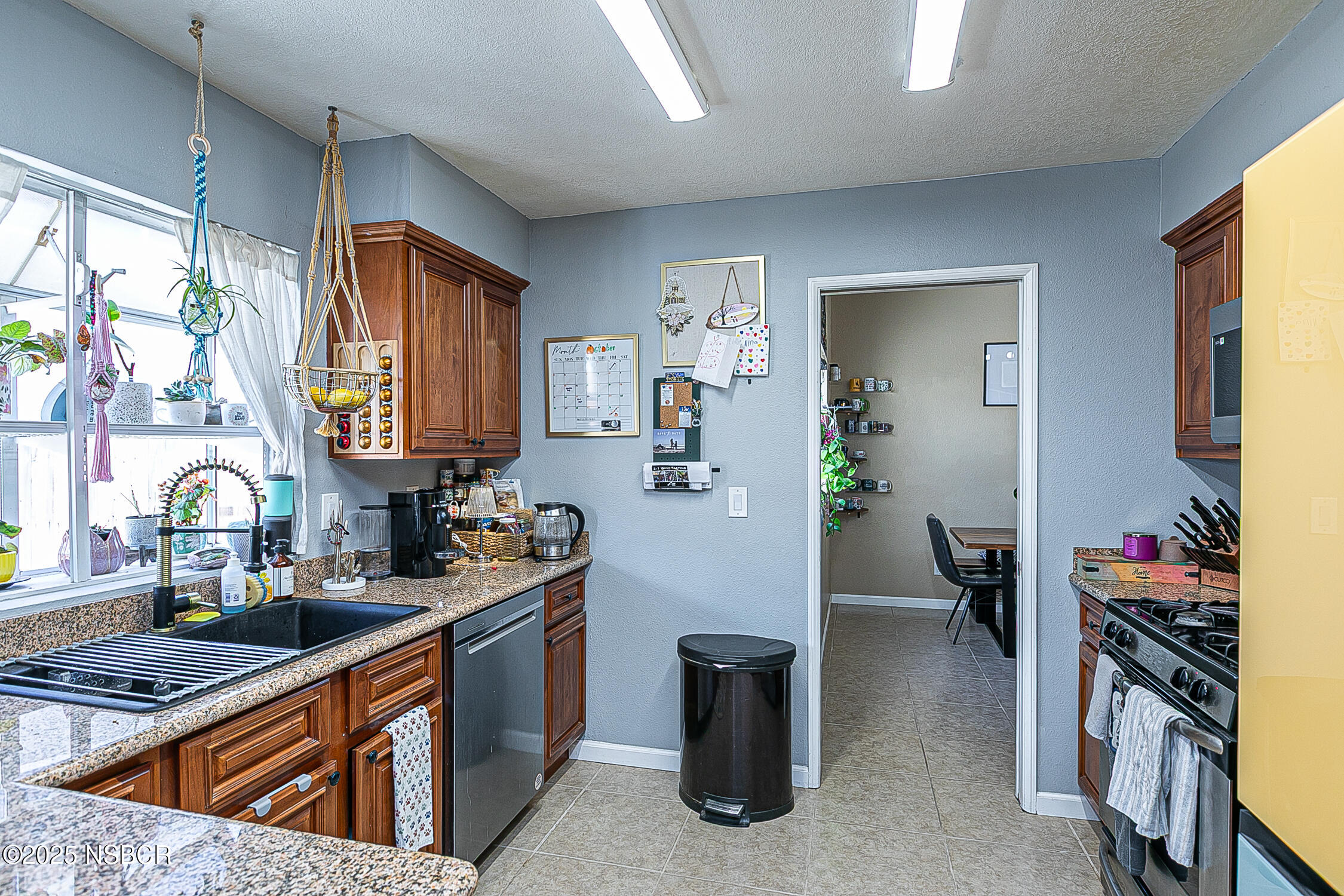1320 Marigold Way Lompoc, CA 93436 - Photo 11 of 42 a kitchen that has a lot of fruit in it