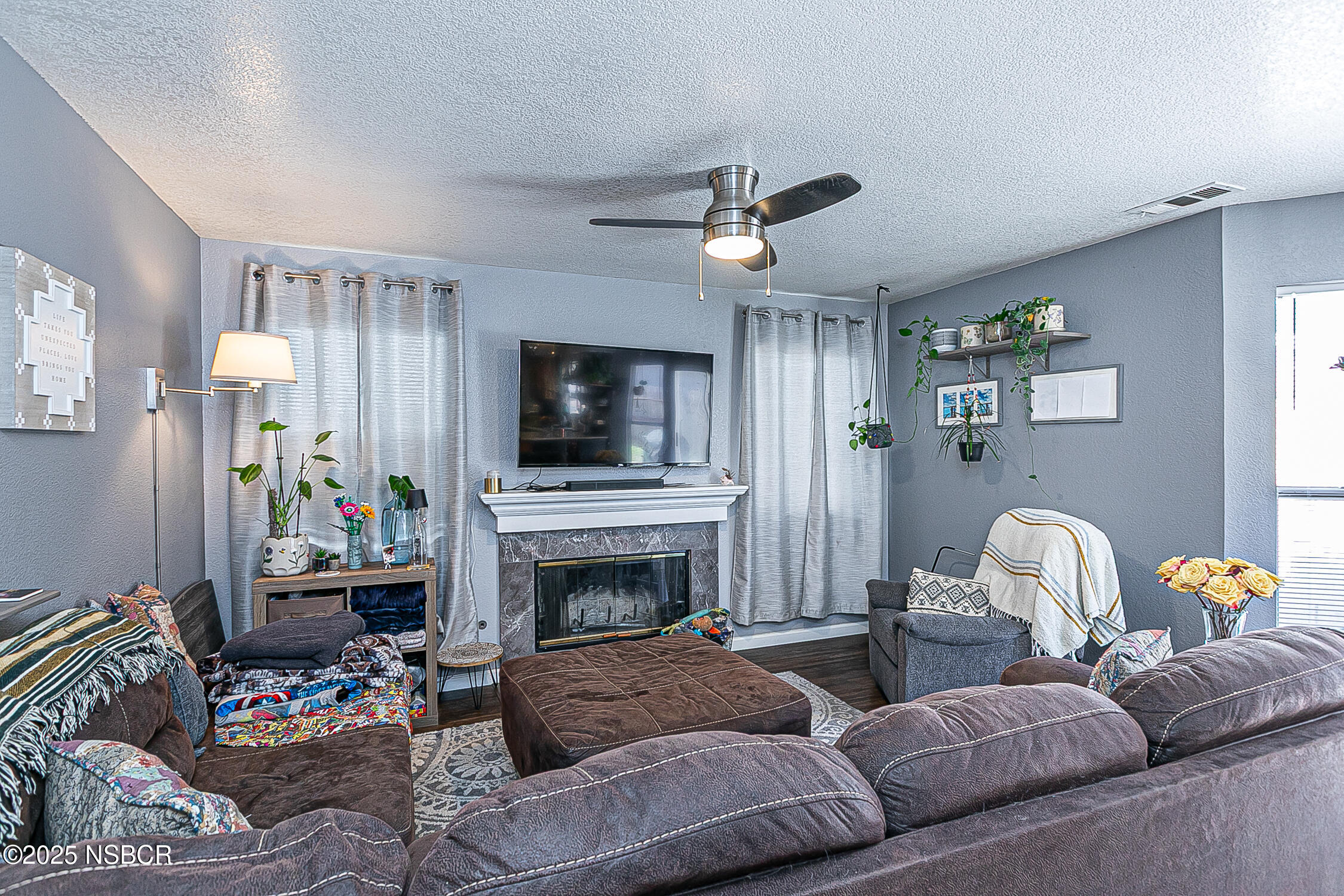 1320 Marigold Way Lompoc, CA 93436 - Photo 15 of 42 a living room with furniture and a fireplace