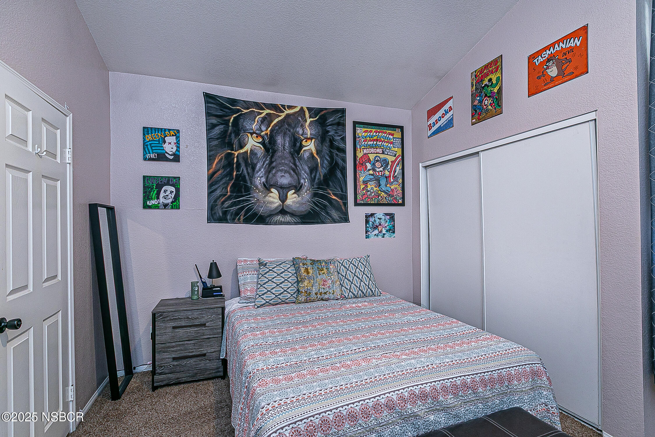 1320 Marigold Way Lompoc, CA 93436 - Photo 24 of 42 a bedroom with a bed and wall painting