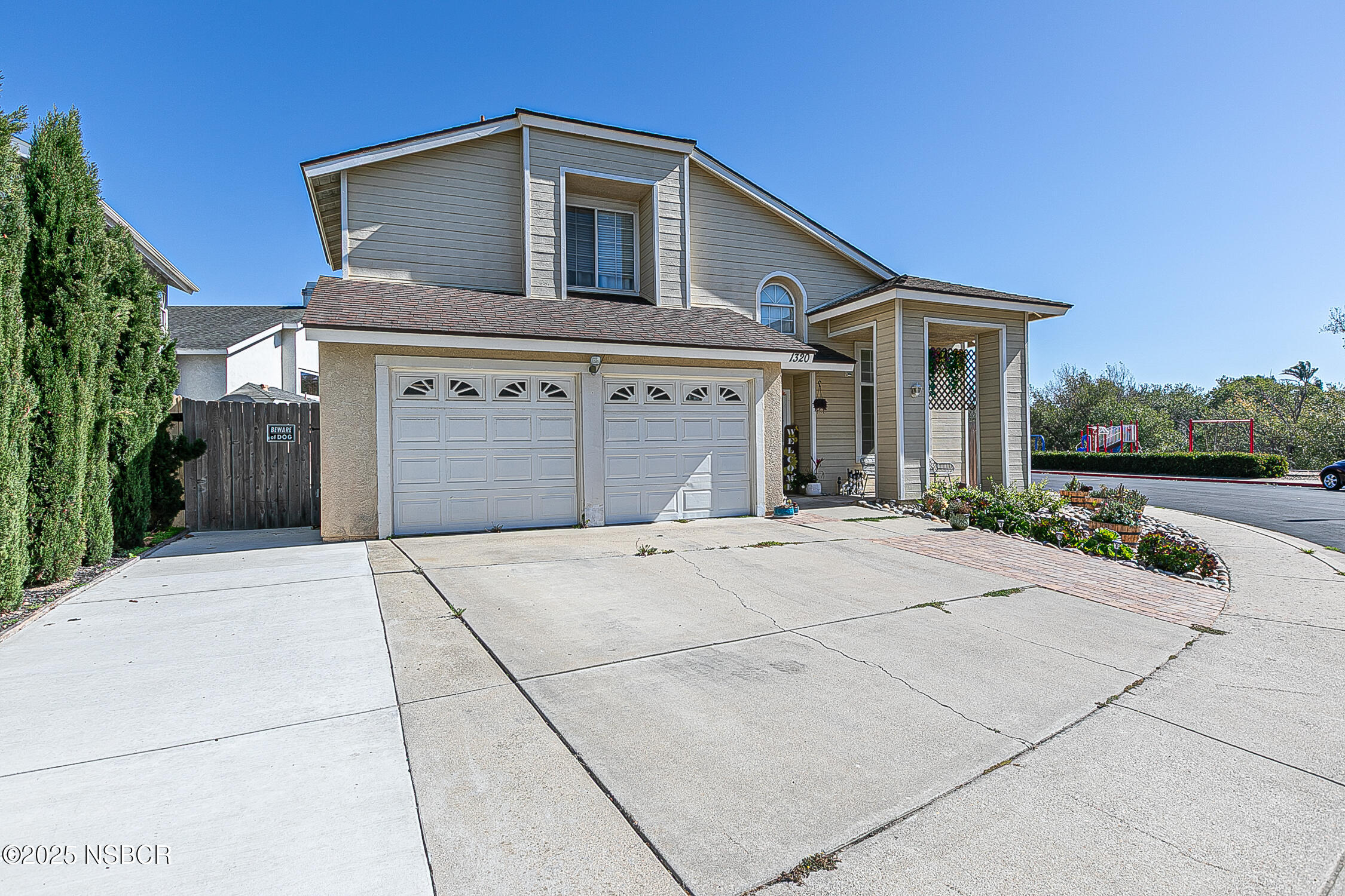 1320 Marigold Way Lompoc, CA 93436 - Photo 3 of 42 a front view of a house with yard