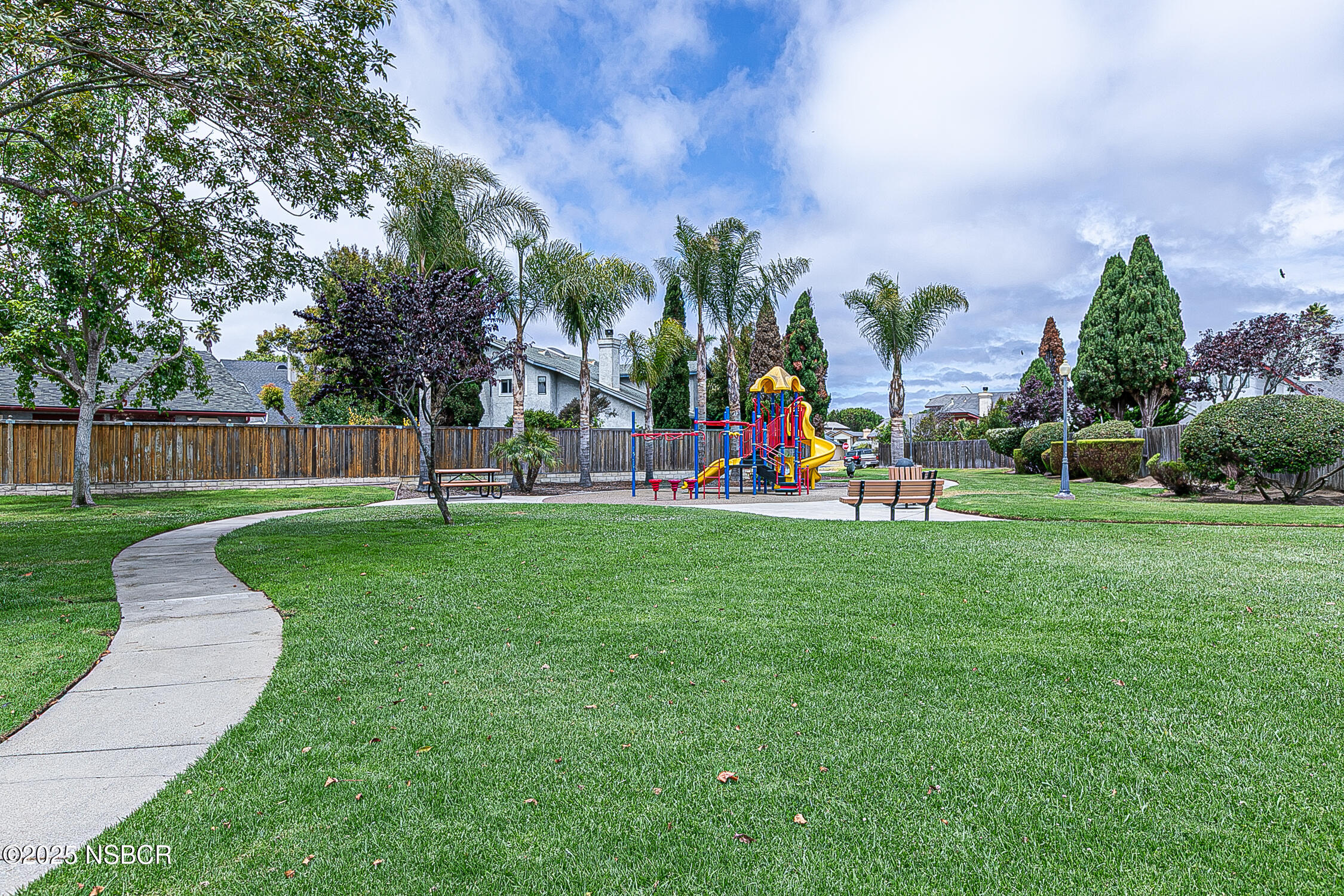 1320 Marigold Way Lompoc, CA 93436 - Photo 40 of 42 a childrens park with lots of swings and slides
