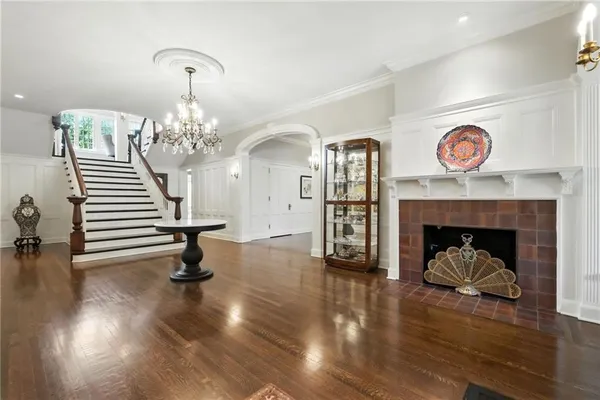 a view of a livingroom with furniture and a fireplace