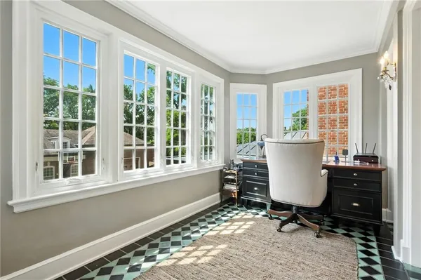 a view of a room with a table and chair