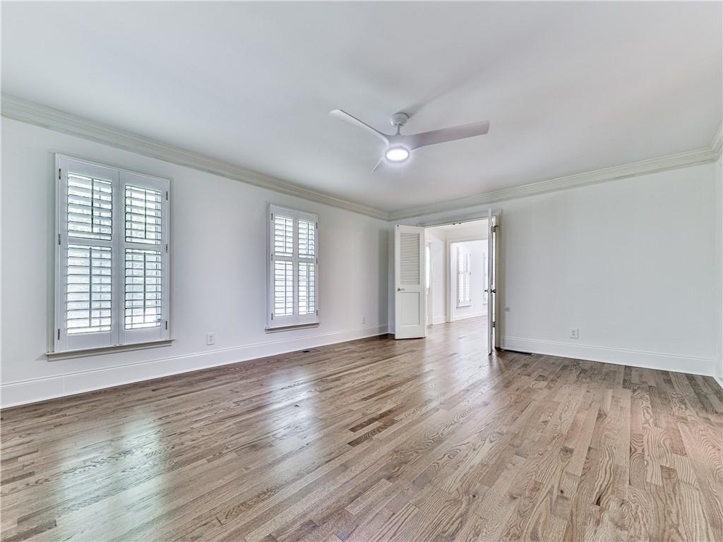 633 Butterworth Road Canton, GA 30114 - Photo 25 of 55 an empty room with wooden floor and windows