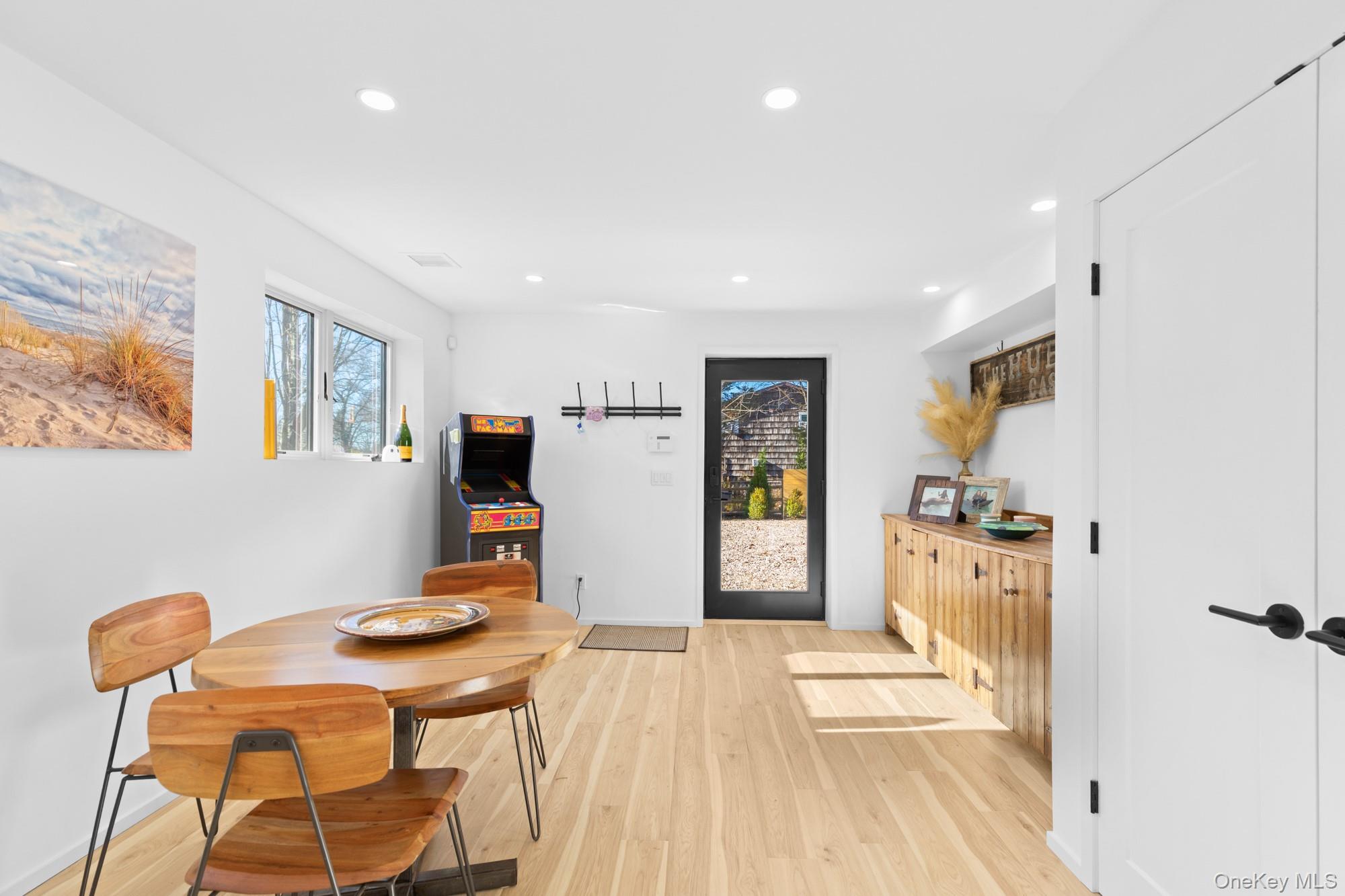 238 Sebonac Road Southampton, NY 11968 - Photo 18 of 23 a kitchen with stainless steel appliances kitchen island granite countertop a refrigerator and a stove top oven