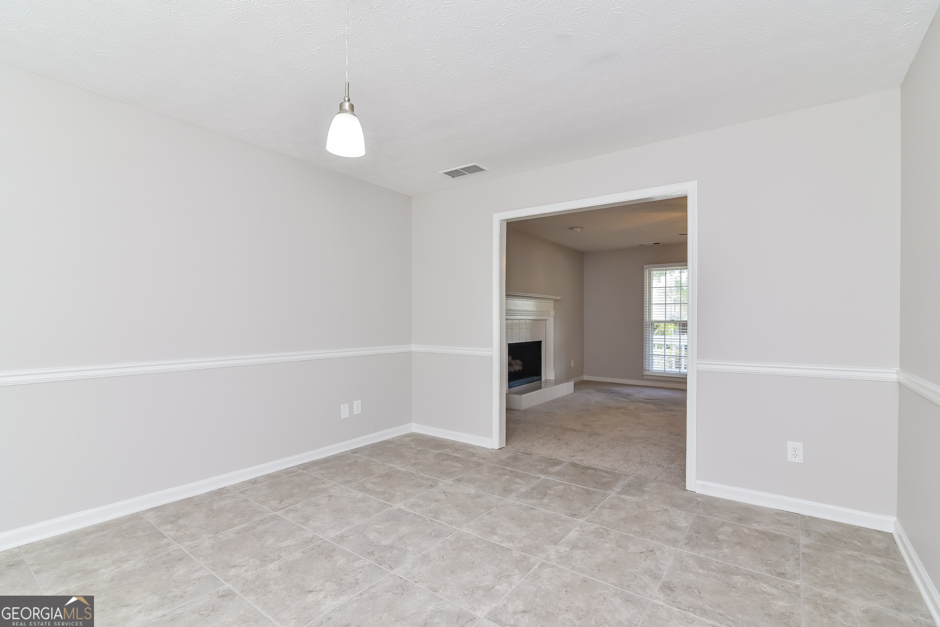 2935 Emerson Lake Drive Snellville, GA 30078 - Photo 5 of 15 a view of empty room with window