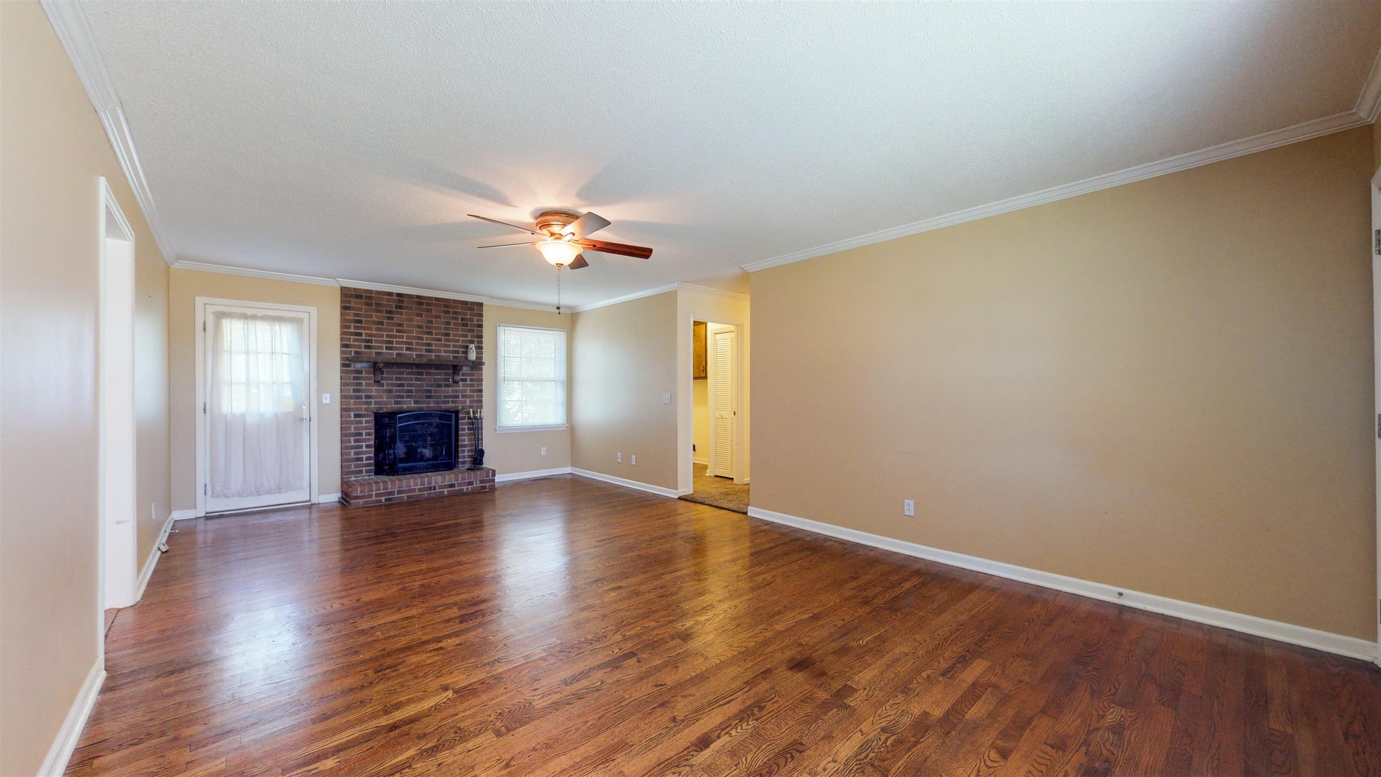 4672 Barfield Crescent Road Murfreesboro, TN 37128 - Photo 2 of 15 Nice size living room with wood burning fireplace