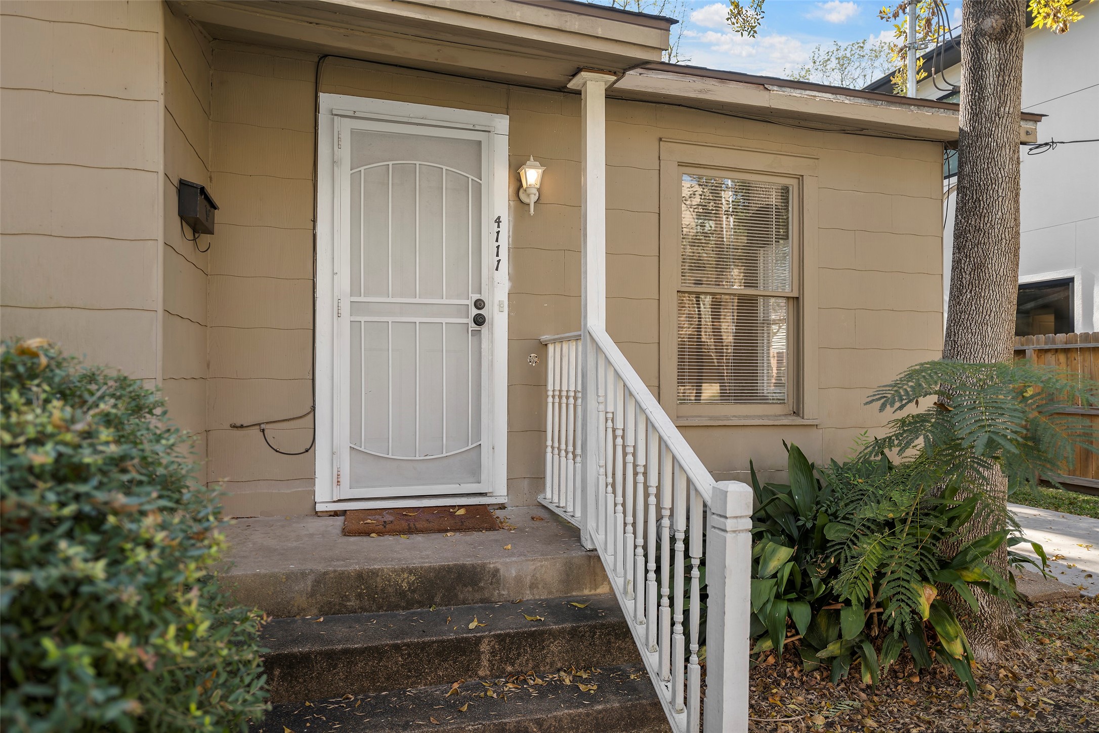4111 Law Street West University Place, TX 77005 - Photo 2 of 29 a view of a house with a small yard