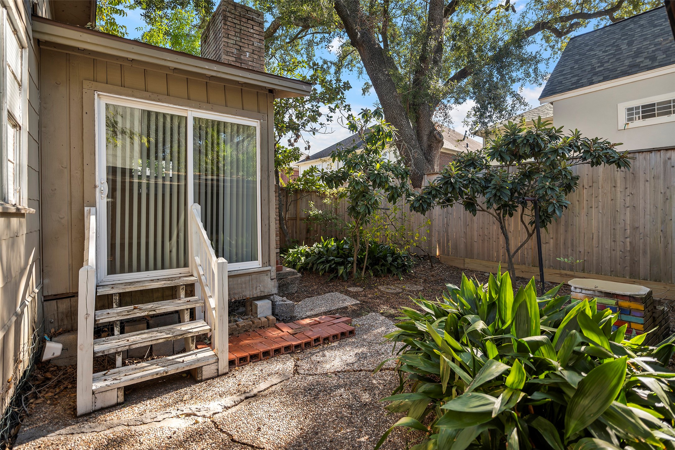 4111 Law Street West University Place, TX 77005 - Photo 21 of 29 a view of a backyard with plants
