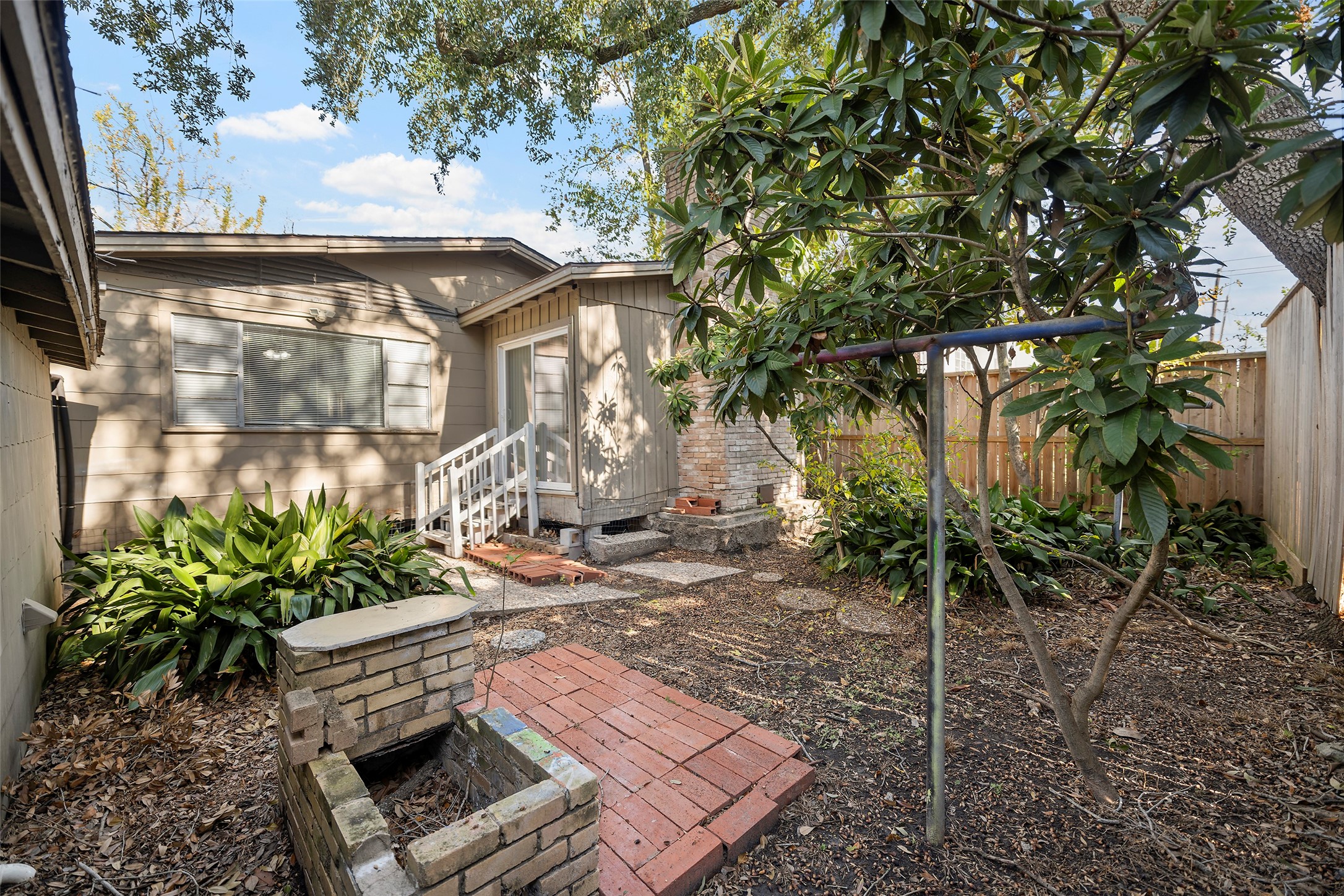 4111 Law Street West University Place, TX 77005 - Photo 23 of 29 a front view of a house with garden