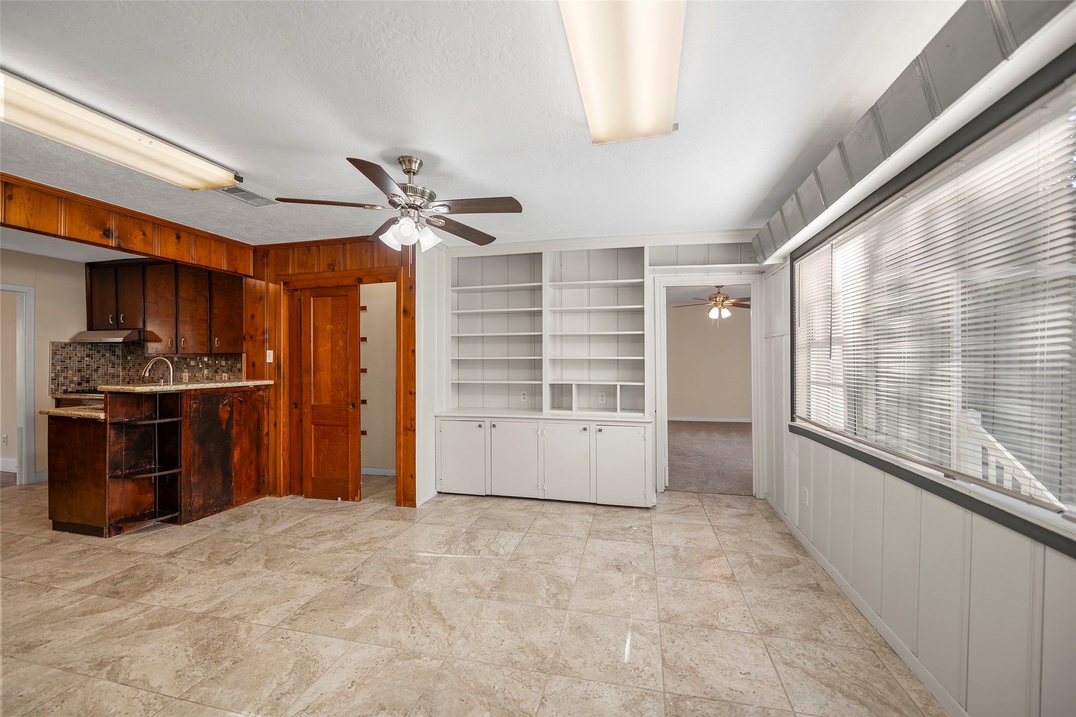 4111 Law Street West University Place, TX 77005 - Photo 24 of 29 a view of a kitchen with a sink and a window