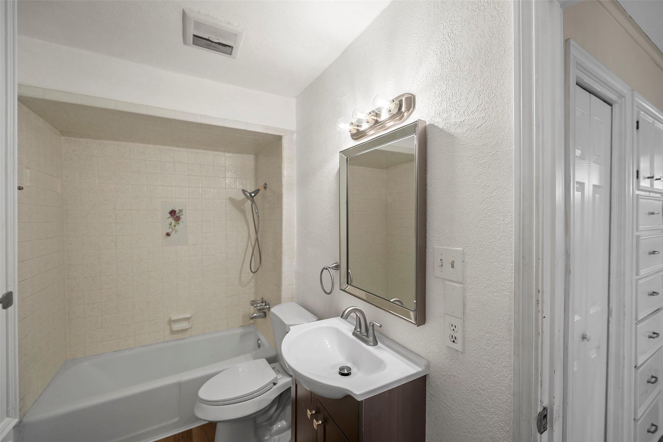 4111 Law Street West University Place, TX 77005 - Photo 27 of 29 a bathroom with a sink toilet and shower