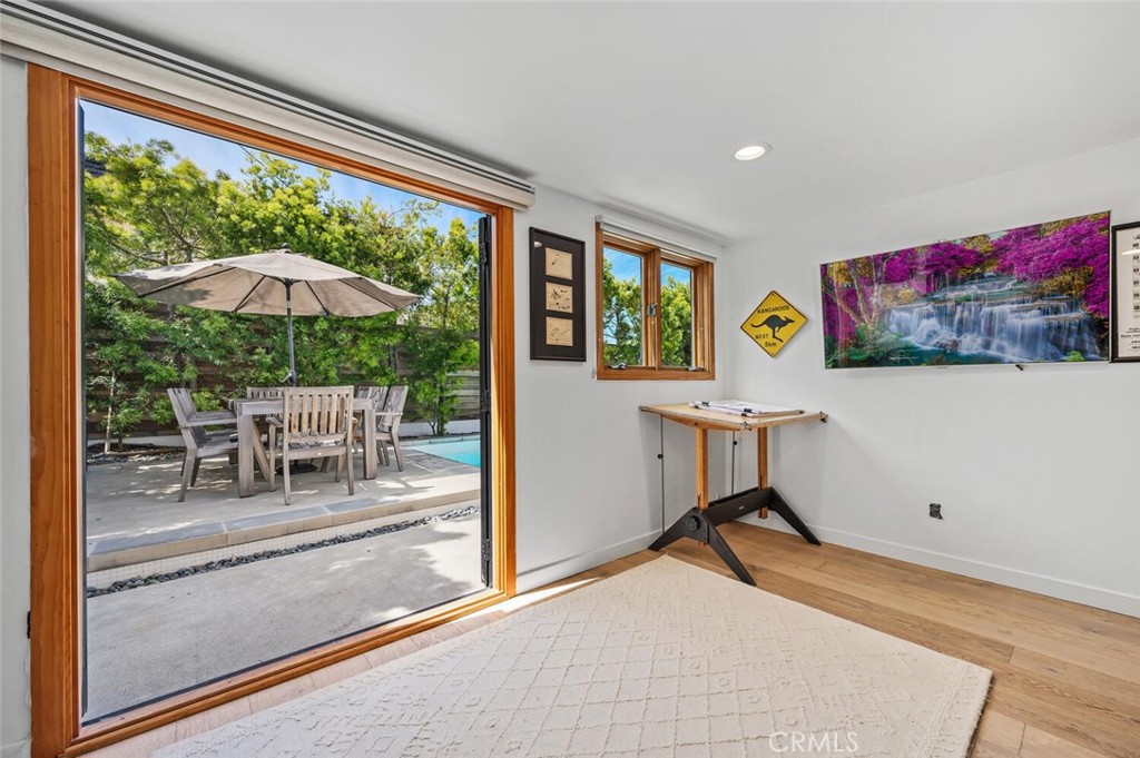 283 Lilac Lane Costa Mesa, CA 92627 - Photo 12 of 22 a room with furniture and a large window