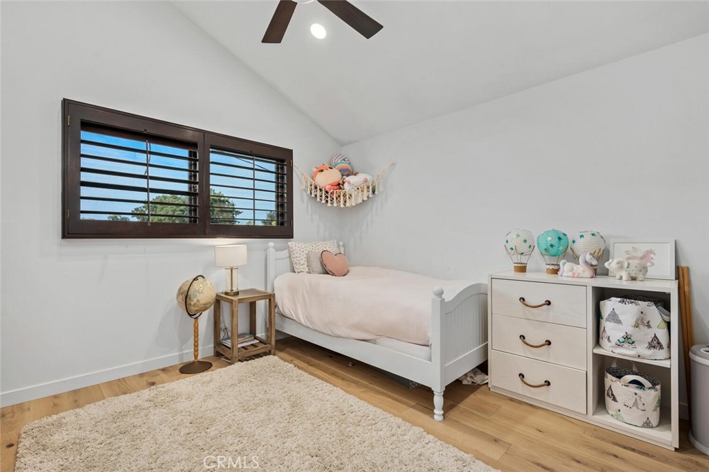 283 Lilac Lane Costa Mesa, CA 92627 - Photo 16 of 22 a bedroom with a bed and a window