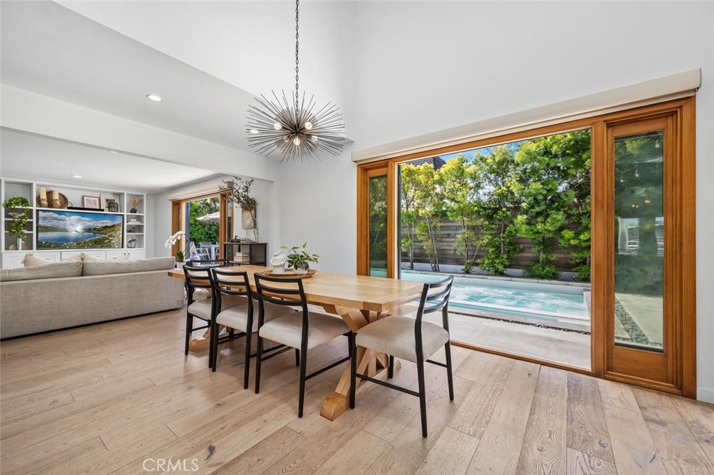 283 Lilac Lane Costa Mesa, CA 92627 - Photo 6 of 22 a view of a dining room with furniture window and outside view
