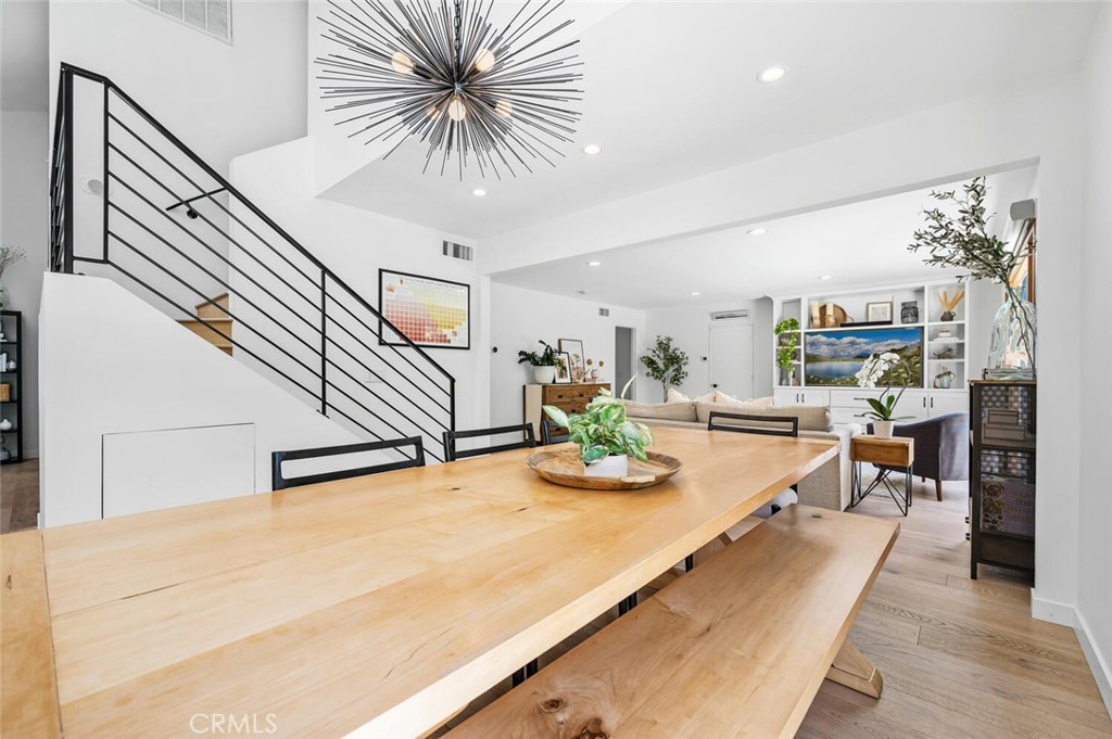 283 Lilac Lane Costa Mesa, CA 92627 - Photo 7 of 22 a view of a living room and kitchen