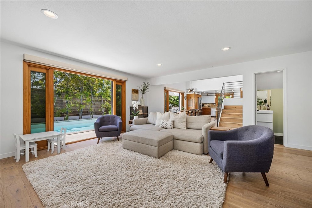 283 Lilac Lane Costa Mesa, CA 92627 - Photo 8 of 22 a living room with furniture and a large window