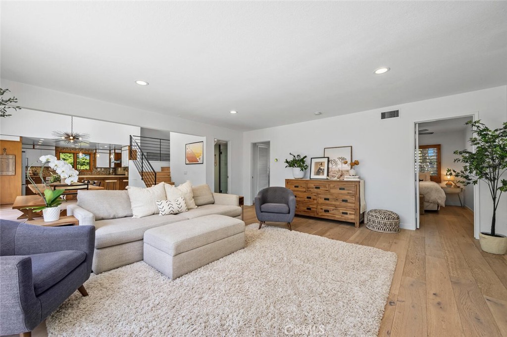 283 Lilac Lane Costa Mesa, CA 92627 - Photo 9 of 22 a living room with furniture and a couch