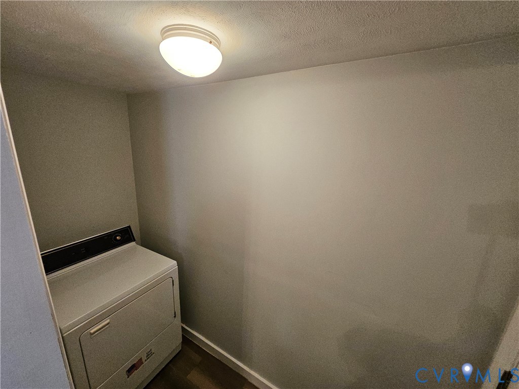 305 5th Street Blackstone, VA 23824 - Photo 11 of 12 a room with a dryer and washer