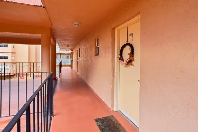 a view of a building with a street