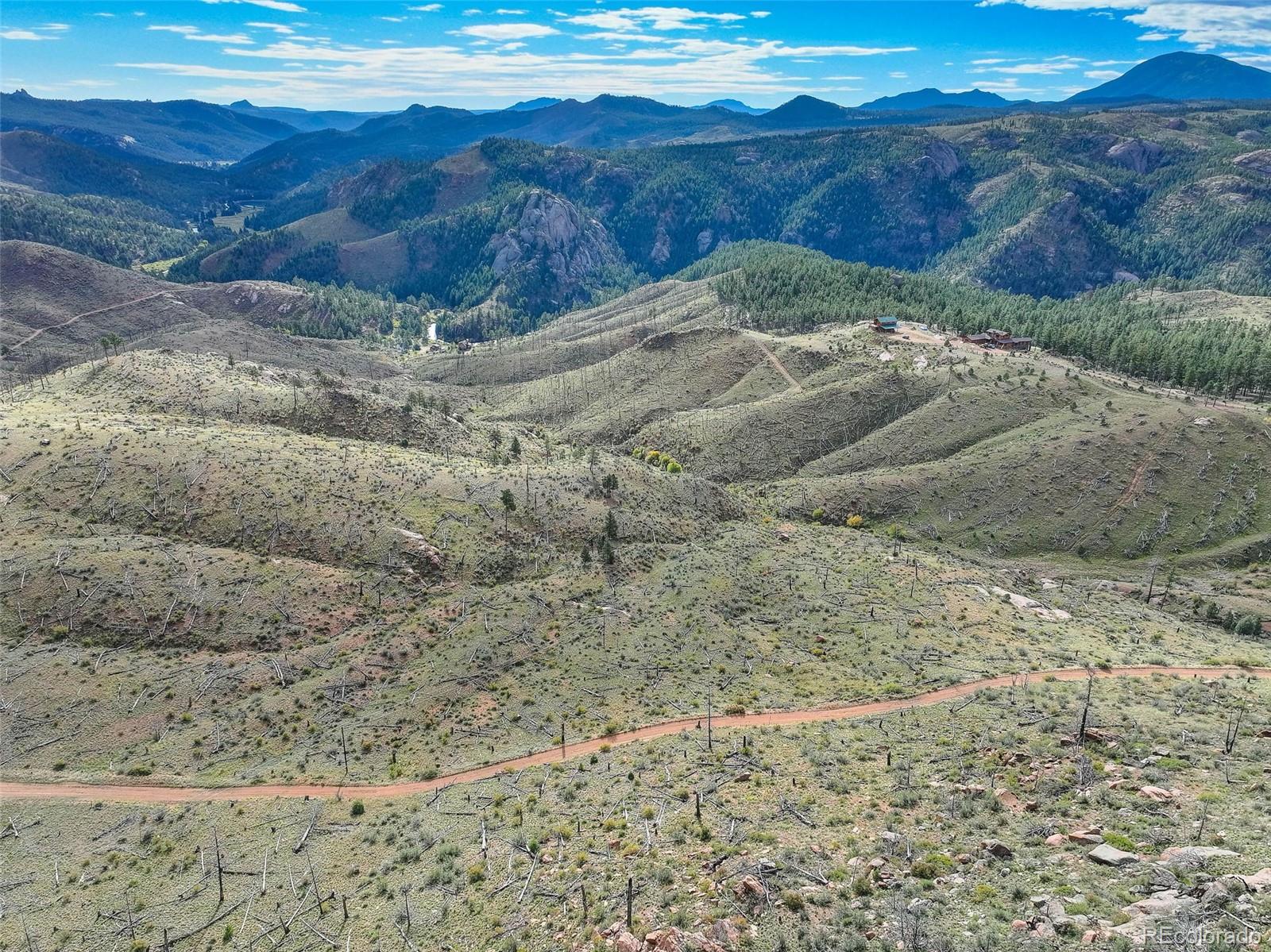 770 Holmes Gulch Way Bailey, CO 80421 - Photo 4 of 42 a view of mountain view with mountains in the background