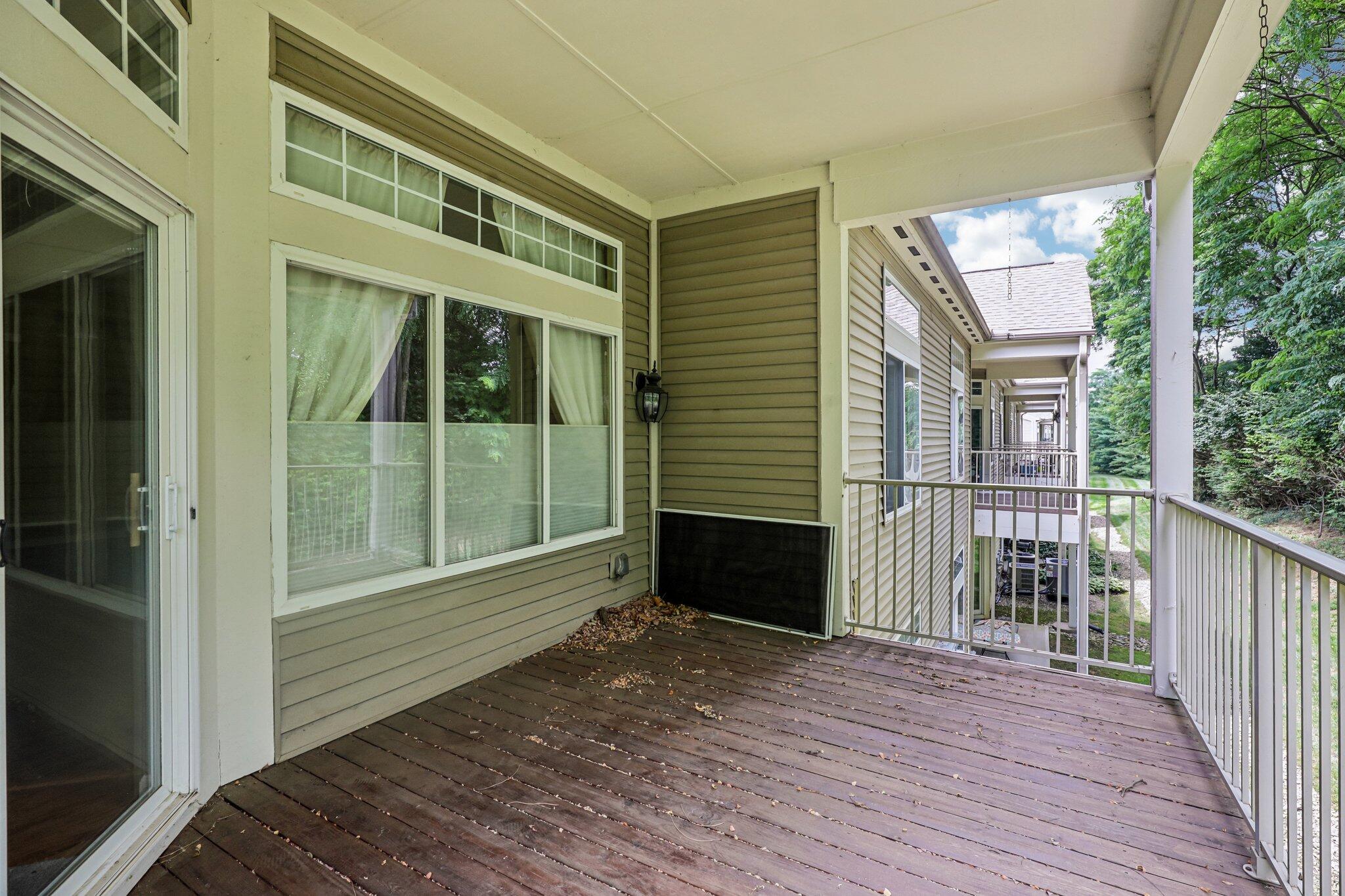 876 Flint Ridge Newport, KY 41076 - Photo 24 of 43 Covered outdoor deck featuring wood-finish flooring, white railing, and siding exterior