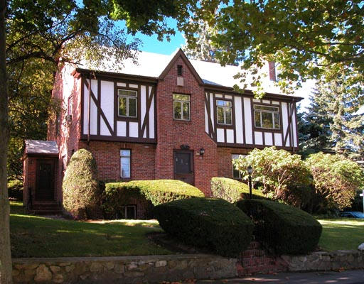 100 Shaw Road Brookline, MA 02467 - Photo 1 of 1 a front view of a house with garden