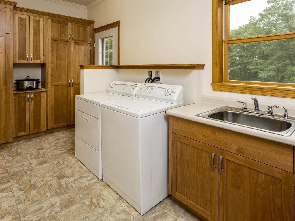 43 Pasture Lane Boothbay, ME 04571 - Photo 26 of 35 The laundry room with washer and...