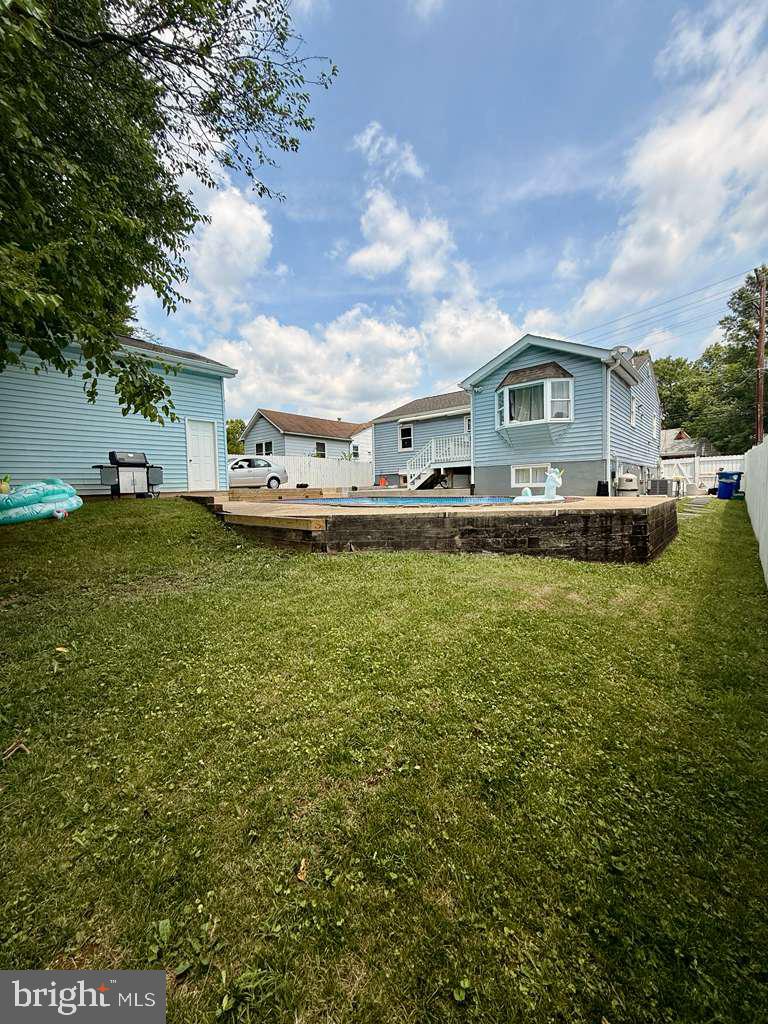 5923 Berwyn Road College Park, MD 20740 - Photo 46 of 51 a view of a house with a big yard and large trees