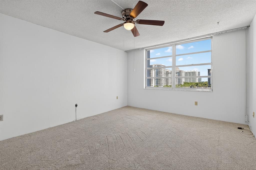 2750 Northeast 183rd Street, Unit 911 Aventura, FL 33160 - Photo 15 of 34 a view of an empty room with a window