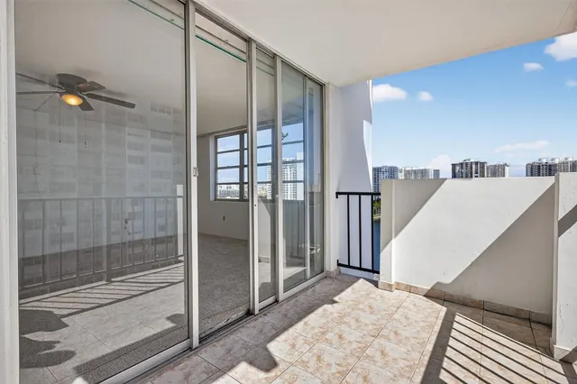 a view of a bathroom with a glass door shower