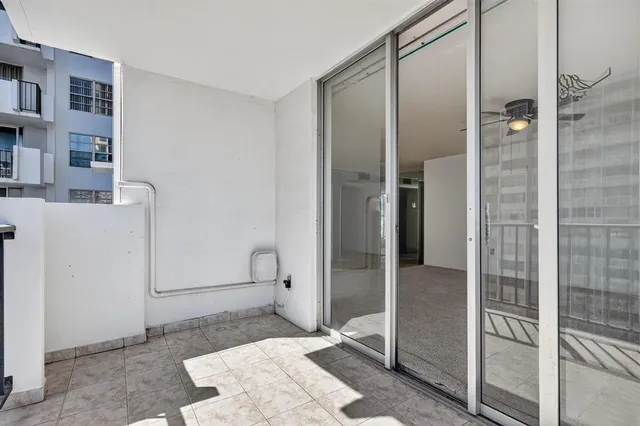 a bathroom with a shower and a sink