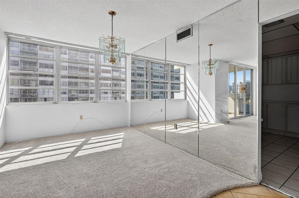 2750 Northeast 183rd Street, Unit 911 Aventura, FL 33160 - Photo 8 of 34 a view of an empty room with a window