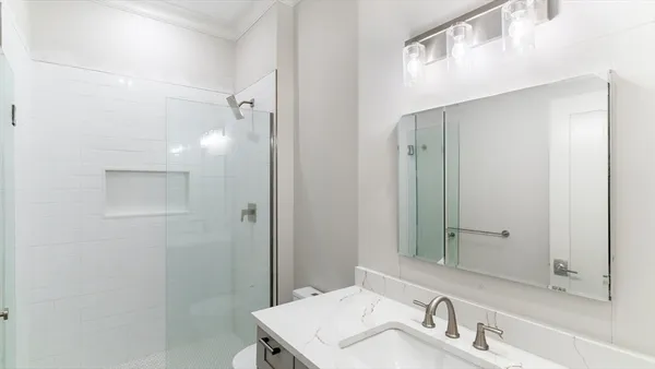 a view of an empty walk in closet