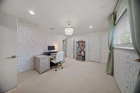 a spacious bathroom with a double vanity sink mirror and double