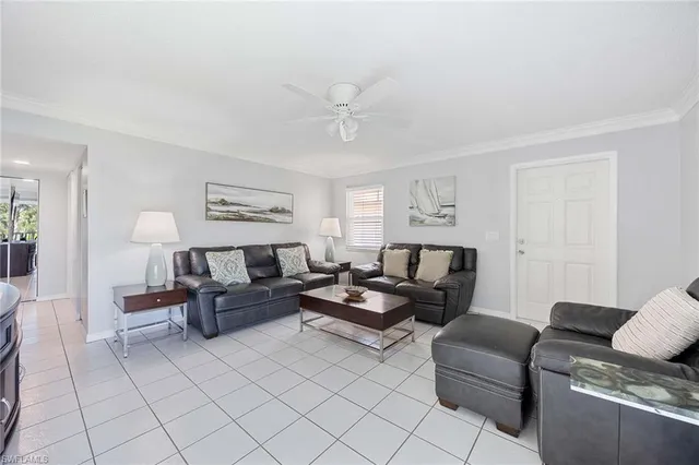 a living room with furniture and a couch