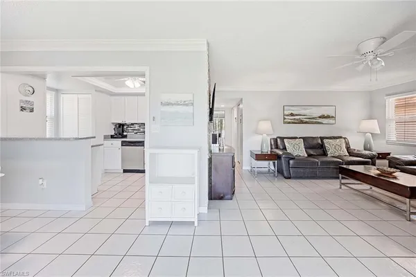 a living room with furniture and a table