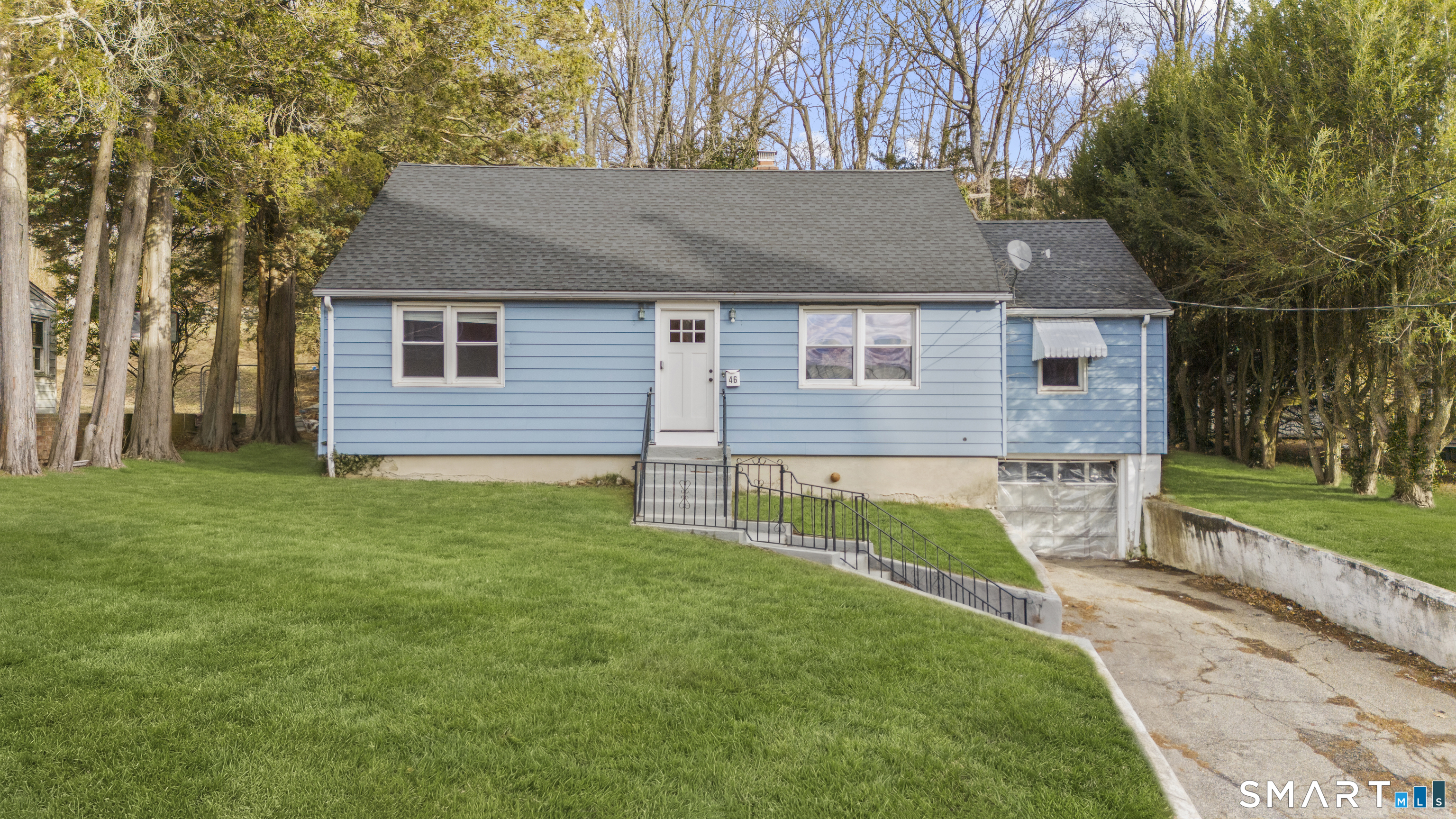 46 North Cliff Street Ansonia, CT 06401 - Photo 1 of 1 a front view of a house with a yard