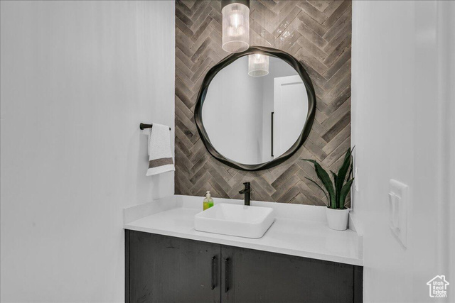 2761 West Lava Hls Road Santa Clara, UT 84765 - Photo 16 of 53 Bathroom with tasteful backsplash and vanity