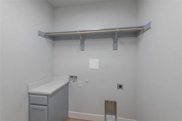 a bathroom with a sink and vanity